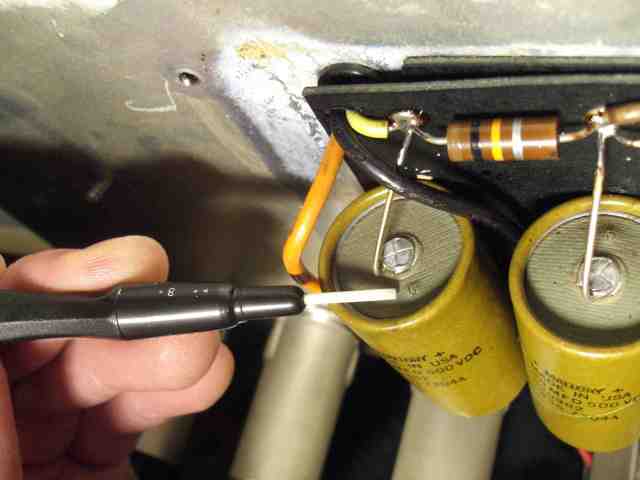 The vents on older mallory caps start to blister as they get leaky and run hotter than they should.  Waiting too long to replace them can lead to a chemical mess at best and a small fire at worst. 